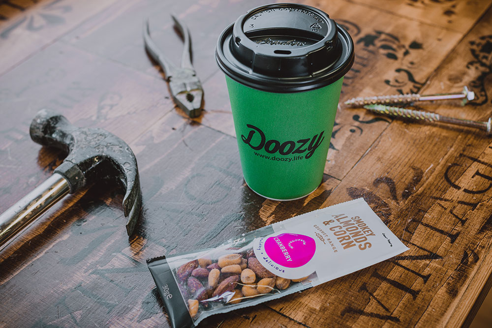 doozy fair trade coffee cup with tools