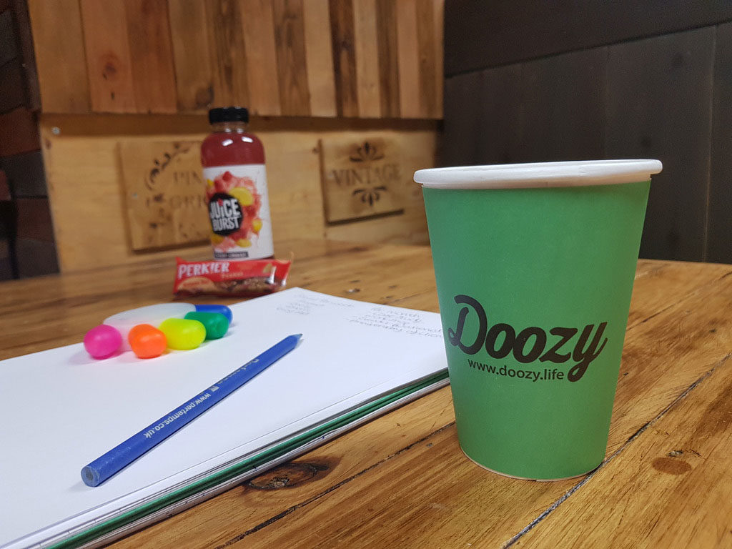 Doozy coffee machine cup with snacks