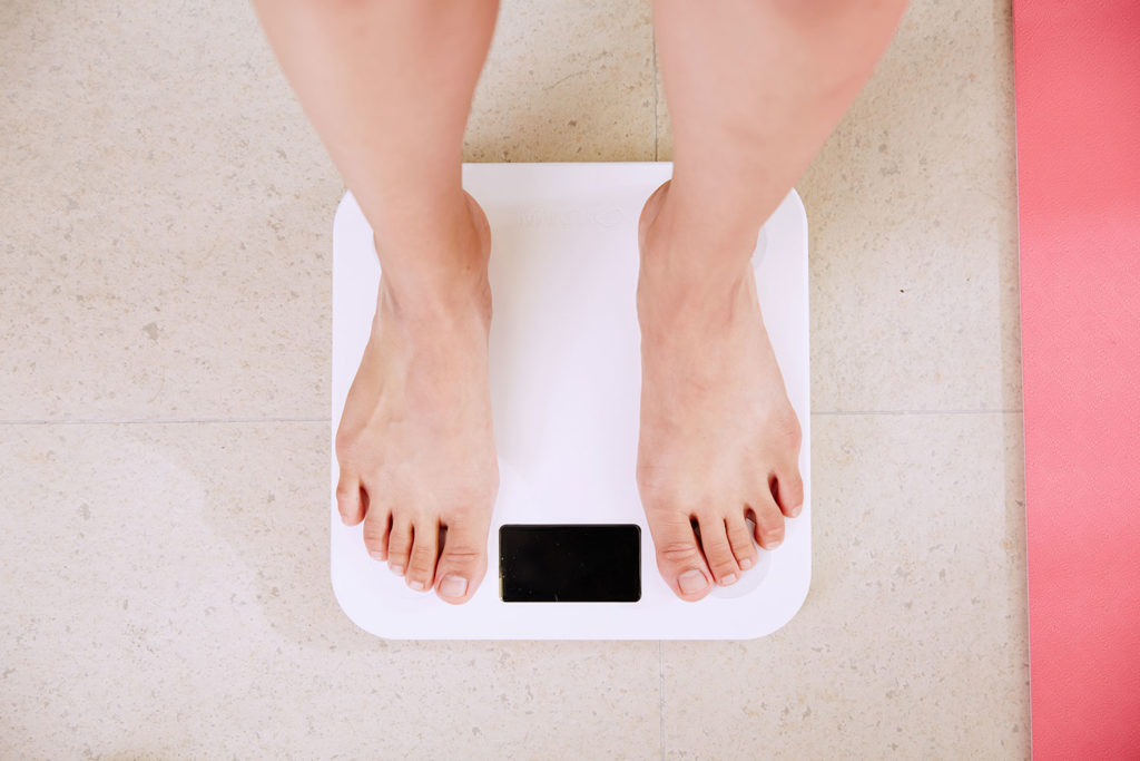 women on scales for diet and healthy lifestyle